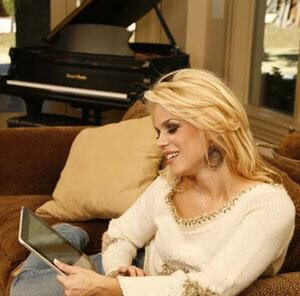 Woman playing music on iPad